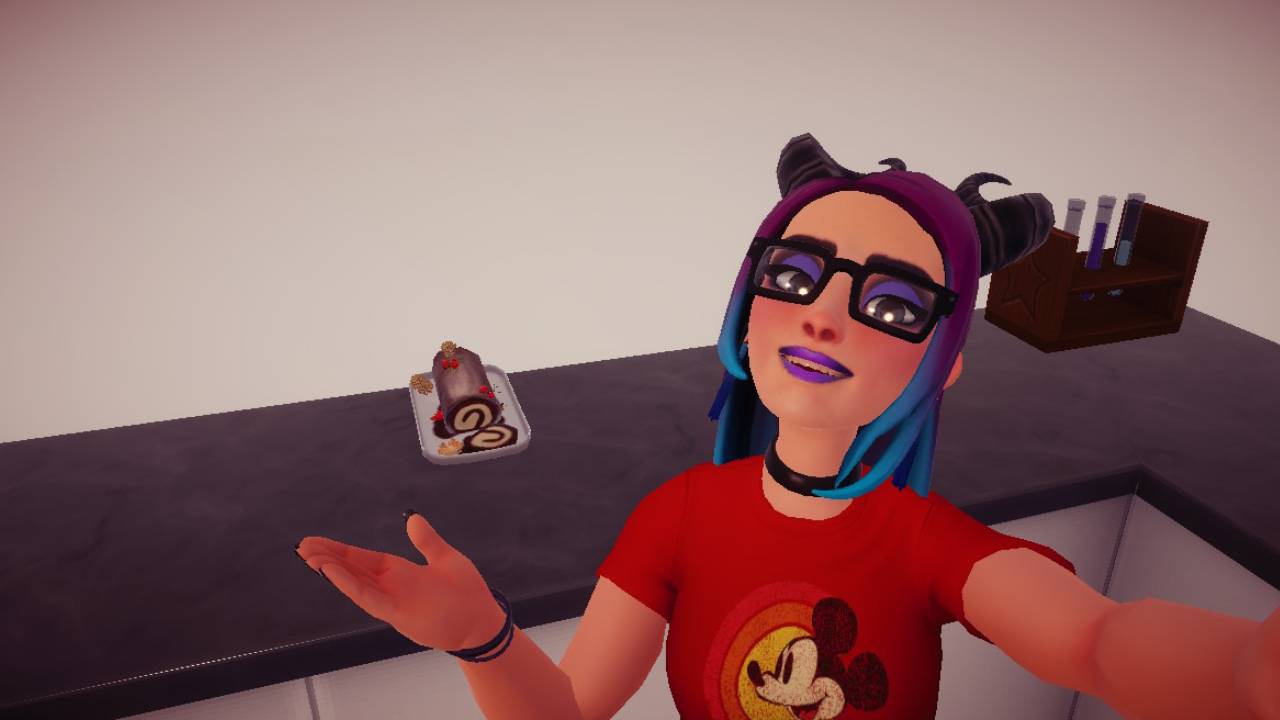 Disney Dreamlight Valley avatar showing off a Yule Log dessert on the kitchen counter.