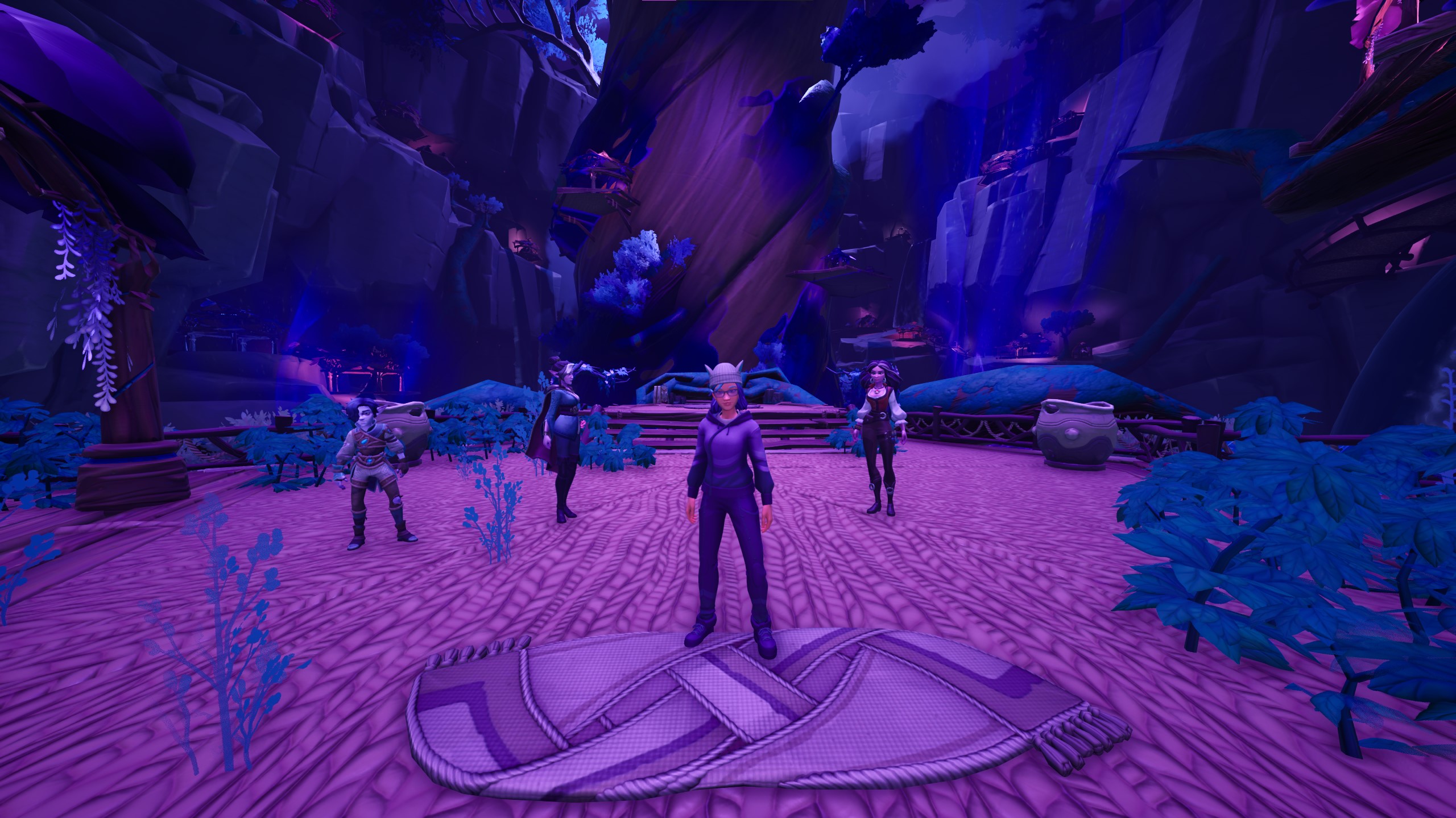Palia avatar with Subira, Tamala, and Ulfe at the base of the Zendruu Tree in the Elderwood.